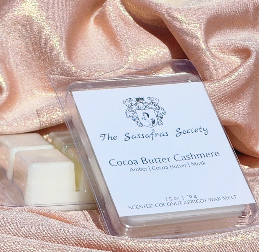 wax melt in container with white label